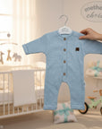 Stork And Baby blue raised waffle texture long sleeve baby romper with wooden buttons