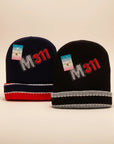 Stork And Baby navy and black knit beanies with red and grey trim, featuring embroidered M311.