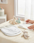 Stork And Baby white 100% cotton 2 pack baby bibs with sentimental "Your First Breath Took Ours Away" embroidery.