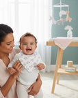 Stork And Baby 3 pack white triangle bibs with a delicate floral pattern for babies.