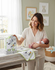 Stork And Baby hooded baby towel and 5 facecloths set with 'Wild About Mom' jungle animal print and lime green trim.