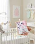 Stork And Baby 3-piece hooded baby towels and 3-piece facecloths set with ladybug print and pink polka dots.