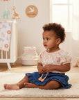 Stork And Baby infant girl's 2-piece set with floral print top and denim skirt