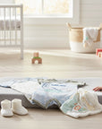 Stork And Baby Infant's 2 pack rompers, 60% cotton 40% polyester, with dinosaur and jungle animal prints.