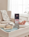 Stork And Baby 3 pack infant socks in navy, white, and grey with nautical theme and pink bows. Cotton blend for 0-6 months.