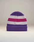 Stork And Baby purple, pink, and white striped knit infants winter hat with cuffed brim.
