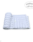 Stork And Baby Mothers Choice grey and white chevron patterned plush coral fleece baby blanket folded for display