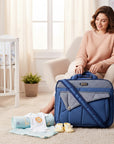 Stork And Baby Mothers Choice Navy Combo Nappy Bag with organized compartments, baby clothes, and booties.