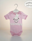 Stork And Baby pink 100% combed cotton baby girl's romper with bunny and heart embroidery and lace trim.