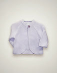 Stork And Baby purple knit infant cardigan with a single button closure and 3/4 sleeves.