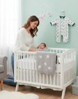 Stork And Baby white quilted grower with green trim and a green 'Emerald Surfer' print, 100% cotton, for baby boys.