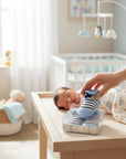 Stork And Baby blue striped baby socks with rocket design, 75% cotton blend, for newborns up to 6 months.