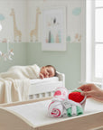 Stork And Baby hooded towel and washcloths set with strawberry design and wash sponge.