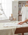 Stork And Baby white cotton baby grow with silver train embroidery, 6-9 months
