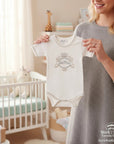 Stork And Baby white 100% combed cotton baby girl's romper with "Little Princess" embroidery and crown detail.