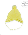 Yellow knit baby hat with a pom-pom on a white background, branded 'Mother's Choice'.