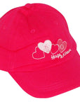 Red cap with white heart designs and text on a white background