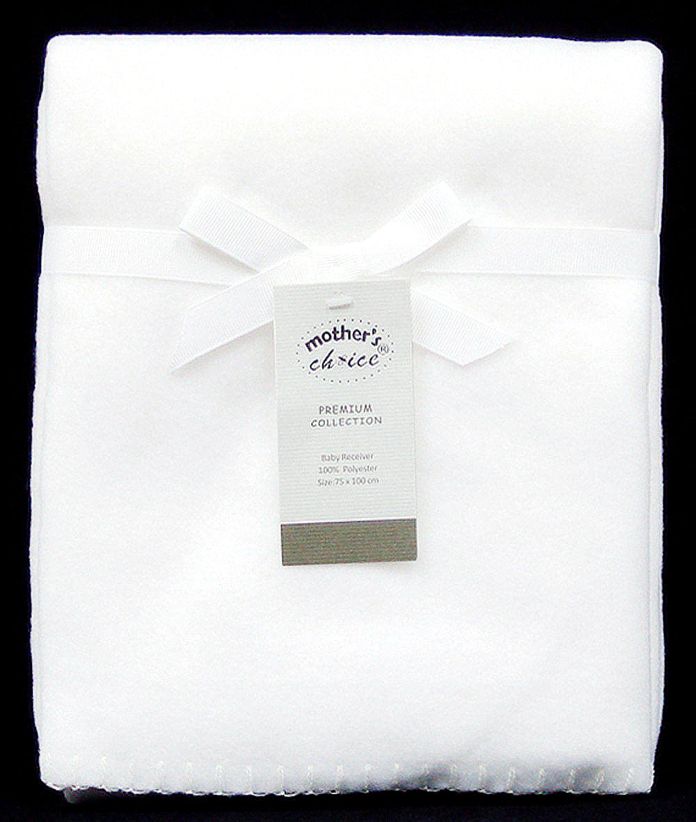 Folded white blanket with a 'mother's choice' label on a black background
