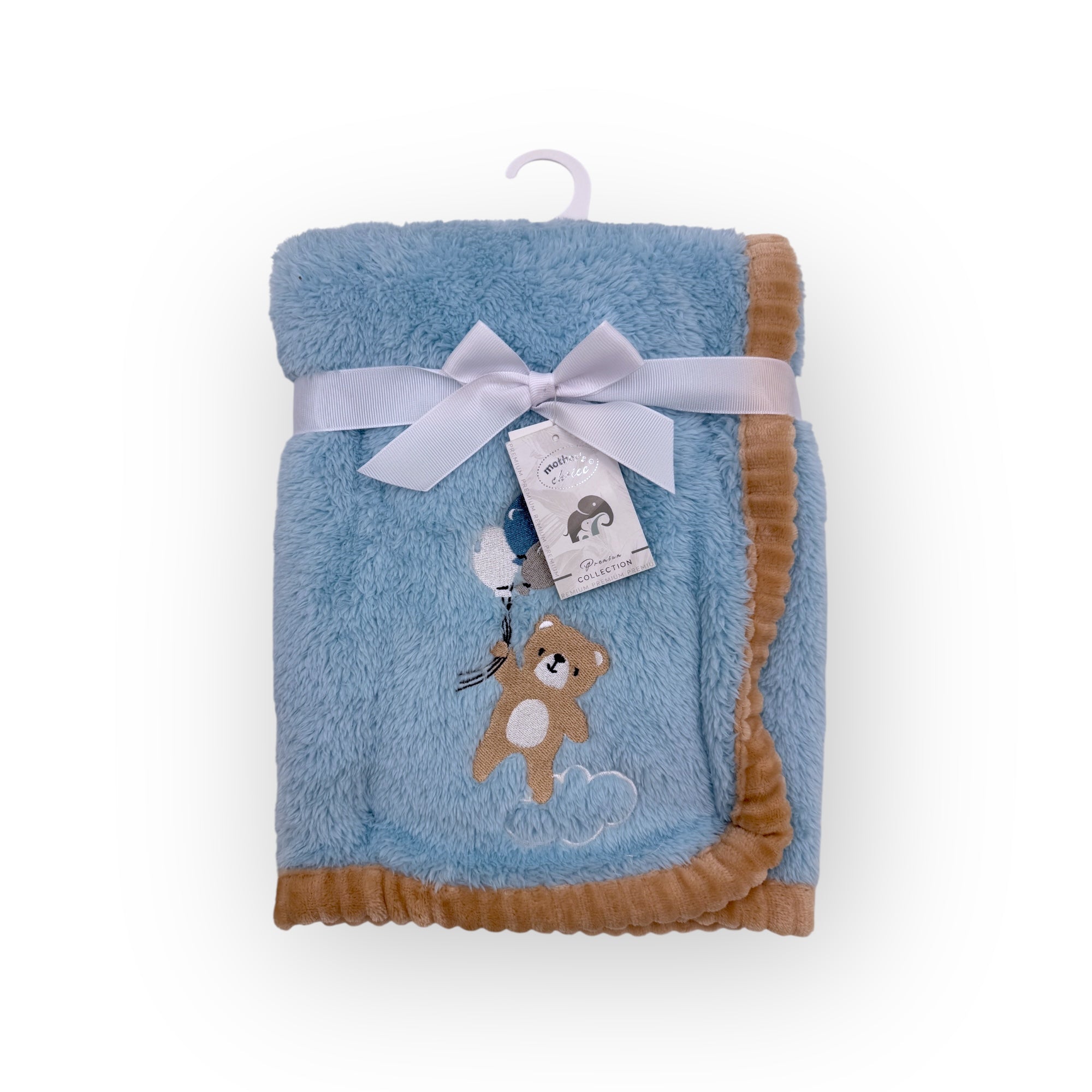 Blue baby blanket with brown trim and teddy bear design on a white background