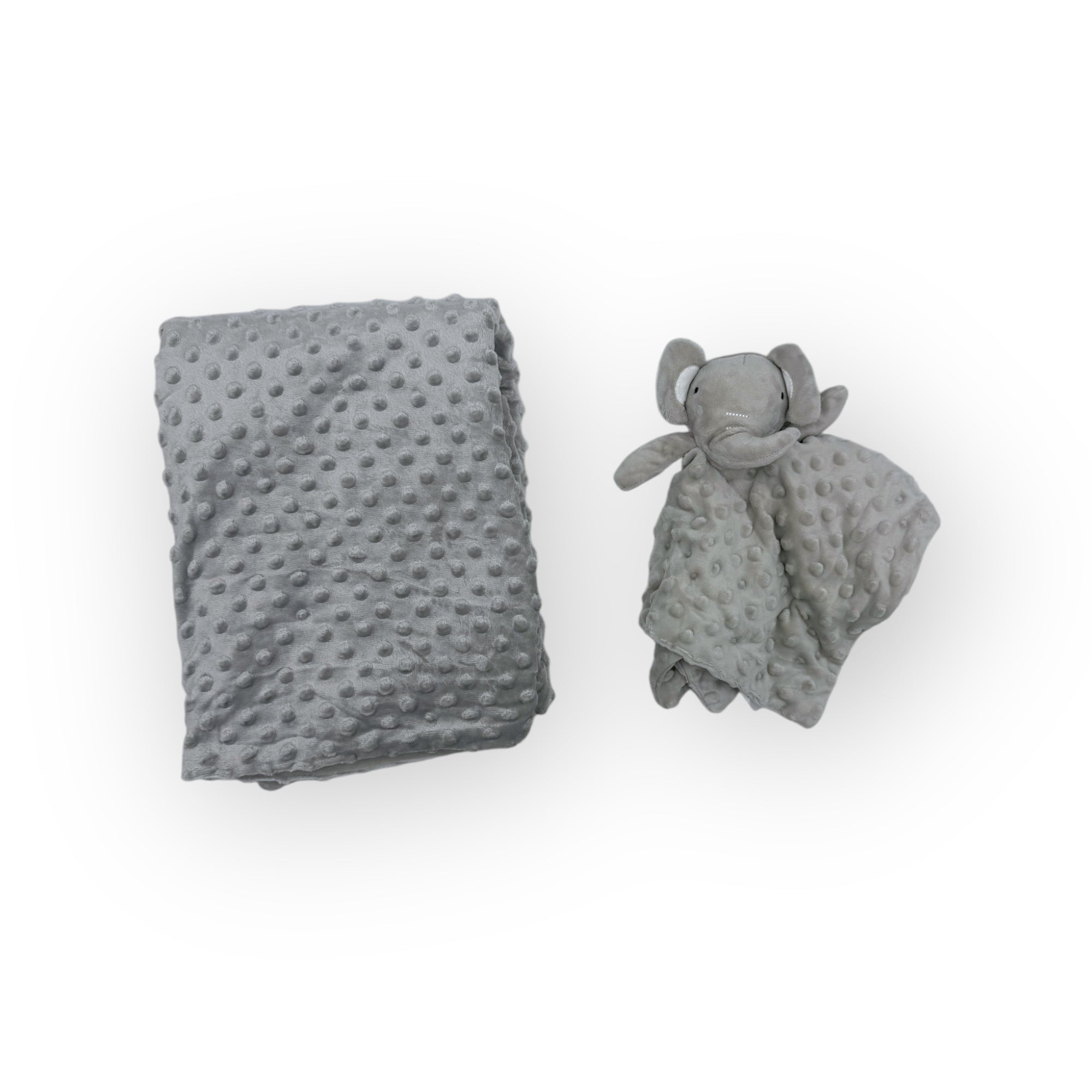Gray textured blanket and elephant-shaped soft toy on a white background