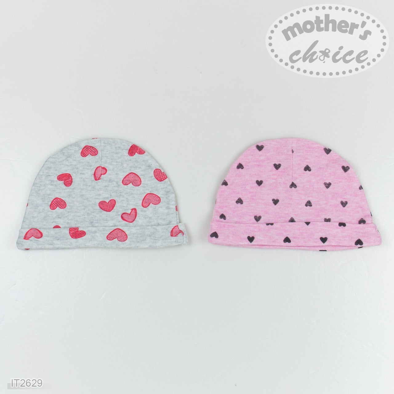Two baby hats with heart patterns on a light gray background, branded 'Mother's Choice'.