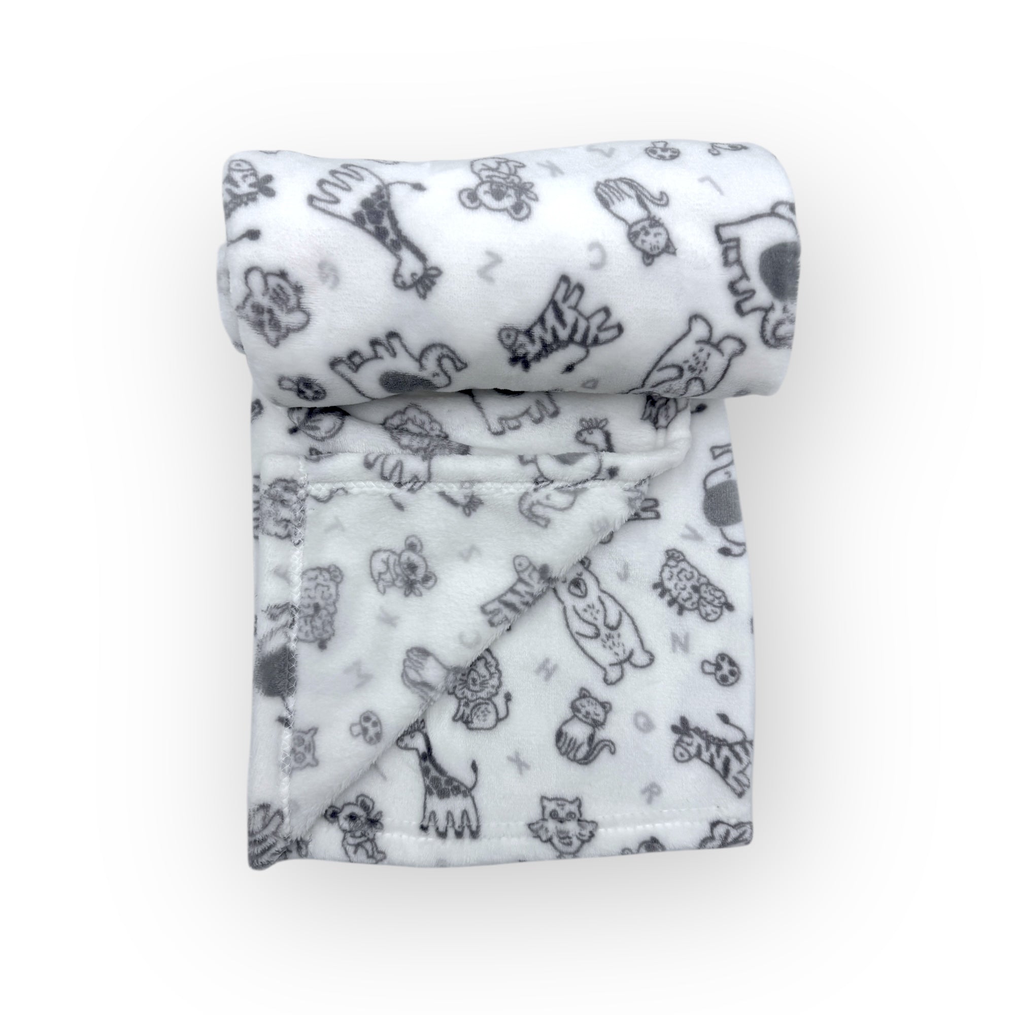 Folded blanket with animal pattern on a white background