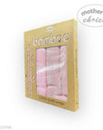 Packaged bamboo muslin wraps with pink and white design on a white background