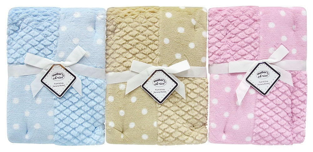 Three baby blankets in blue, beige, and pink with white polka dots, each labeled 'Baby's First'.