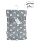 Gray baby blanket with white chevron pattern and a bow, branded 'Mother's Choice', on a white background.