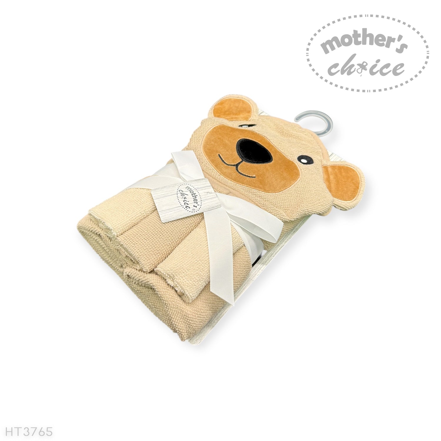 Folded beige blanket with teddy bear face design and 'Mother's Choice' tag on a white background