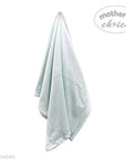 Light blue towel with 'mother's choice' branding on a white background