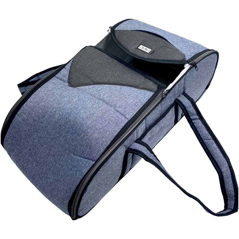 Blue pet carrier with a black interior on a white background