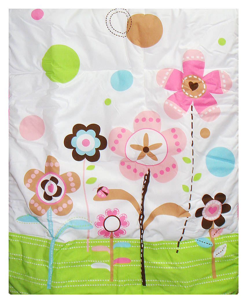 Children's quilt with colorful floral patterns on a white background