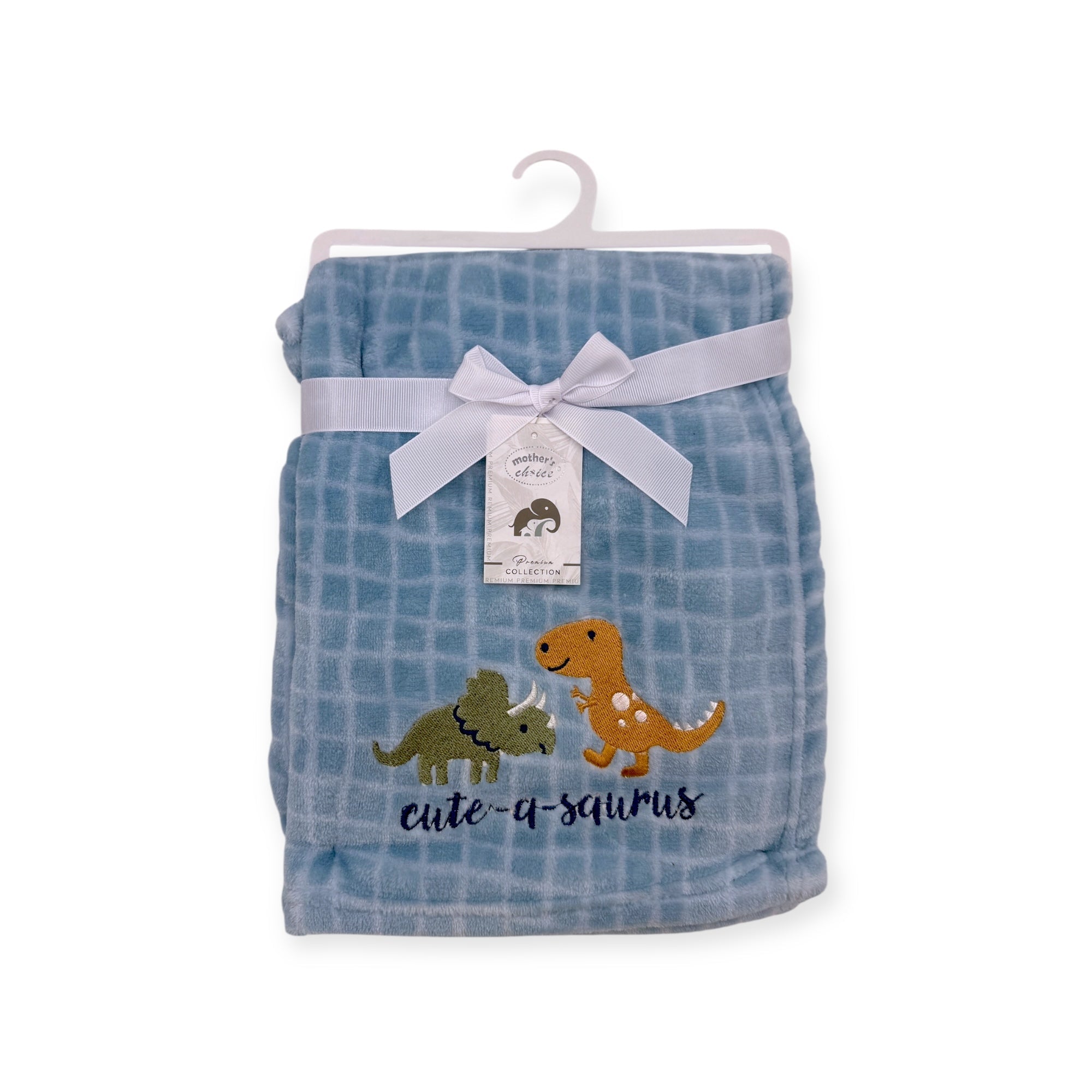 Blue checkered blanket with dinosaur designs and a bow on a white background