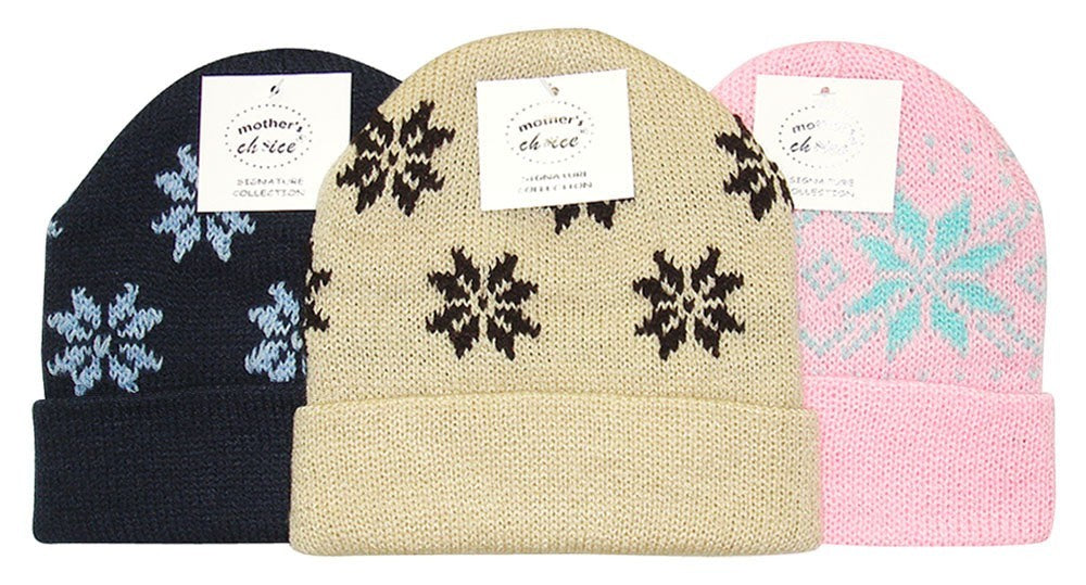 Three knit hats with snowflake patterns in black, beige, and pink on a white background.