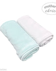 Two rolled-up towels, one light blue and one white, on a white background with 'Mother's Choice' branding.