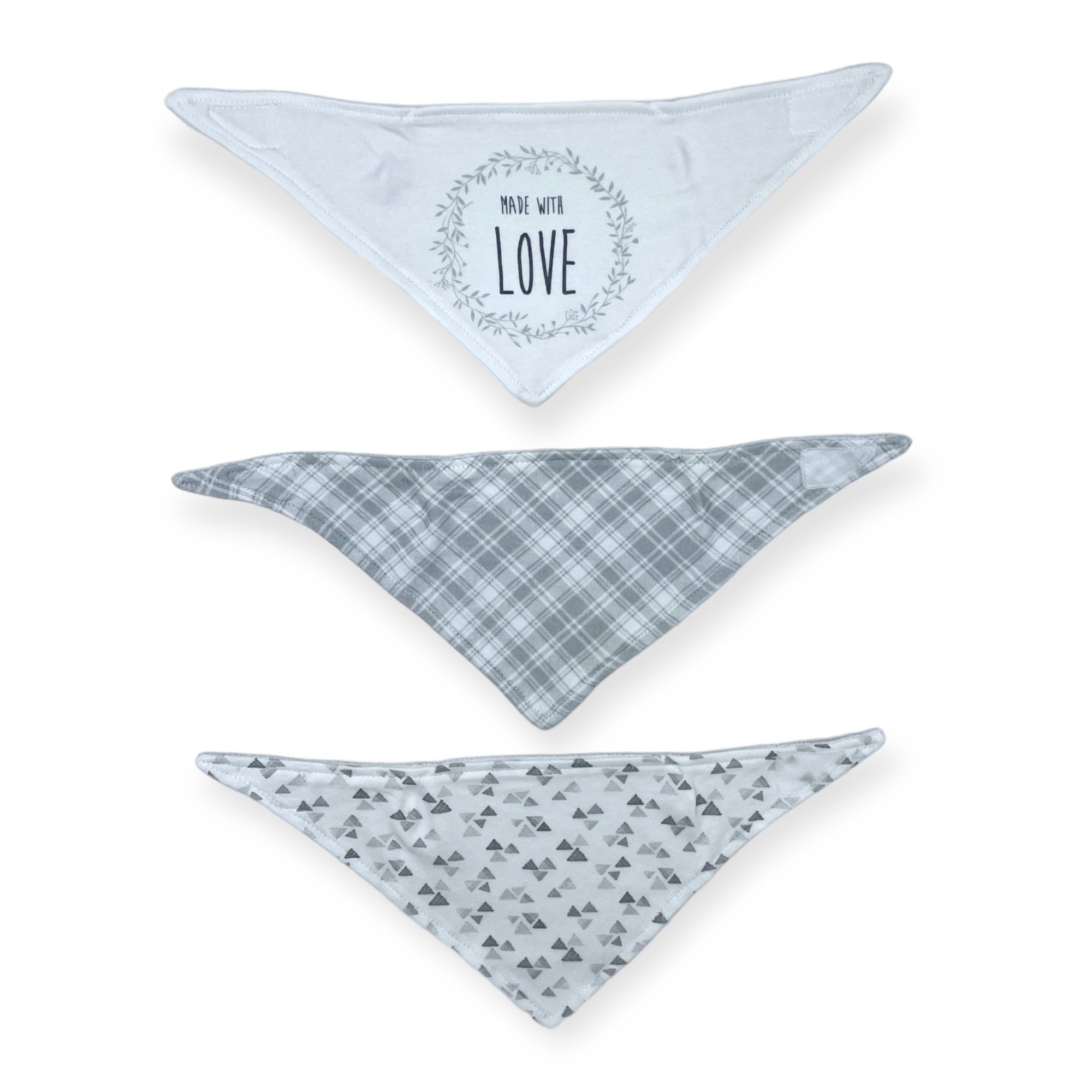 Three blue bandana bibs with different patterns on a white background