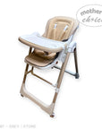 Beige and white baby high chair with 'Mother's Choice' branding on a white background