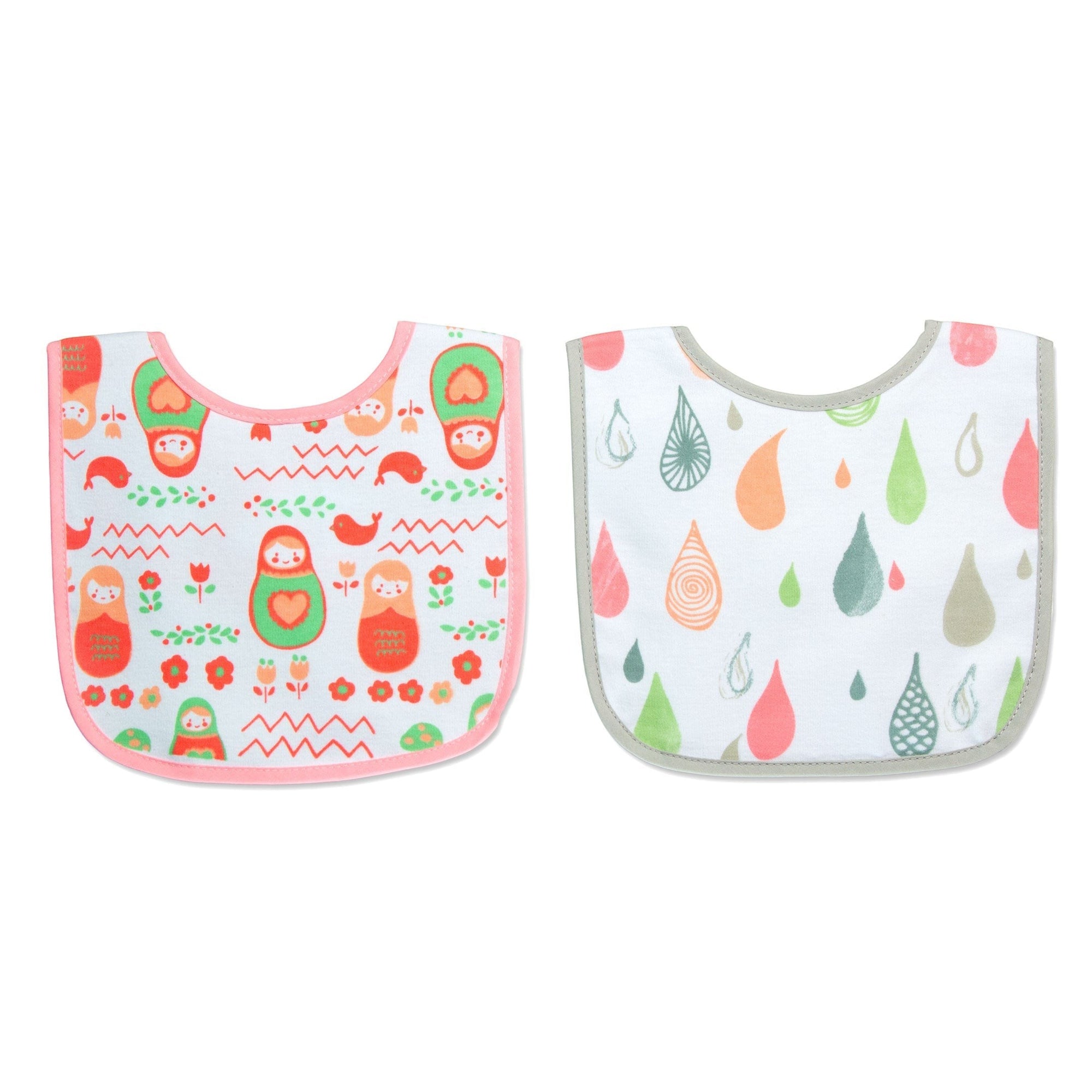 Two baby bibs with different patterns on a white background