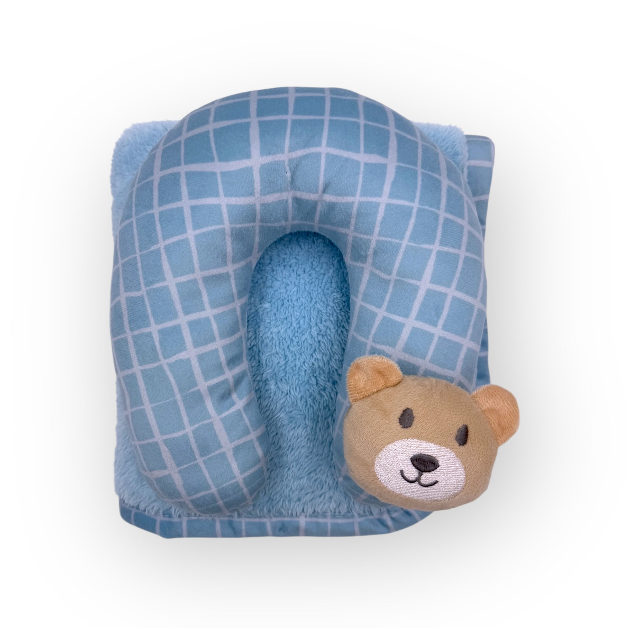 Blue checkered neck pillow with a teddy bear face on a white background
