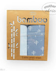 Pack of bamboo jersey wraps with tree pattern in a cardboard box on a white background