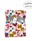 Floral patterned blanket with a gray ribbon and tag on a white background, branded 'Mother's Choice'.