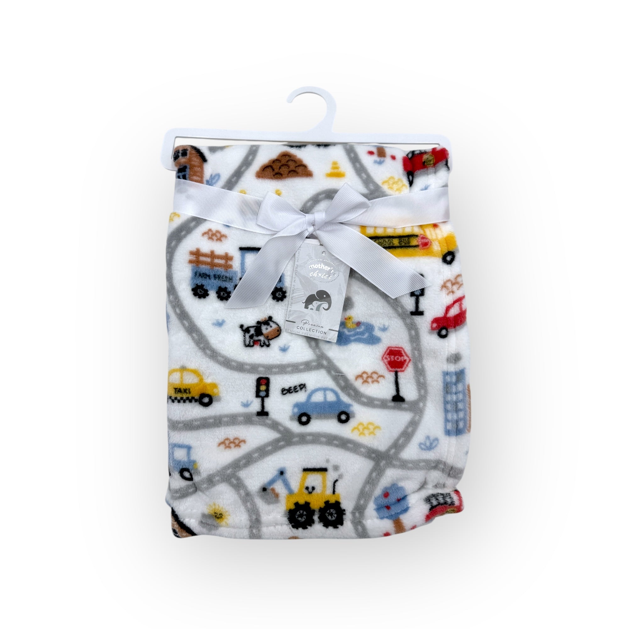 Baby blanket with road and vehicle pattern on a hanger