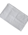 Folded white napkin on a white background