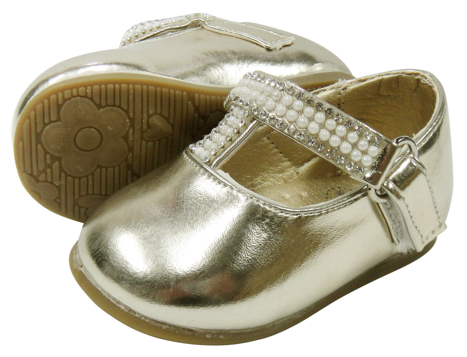 Gold baby shoes with a strap on a white background