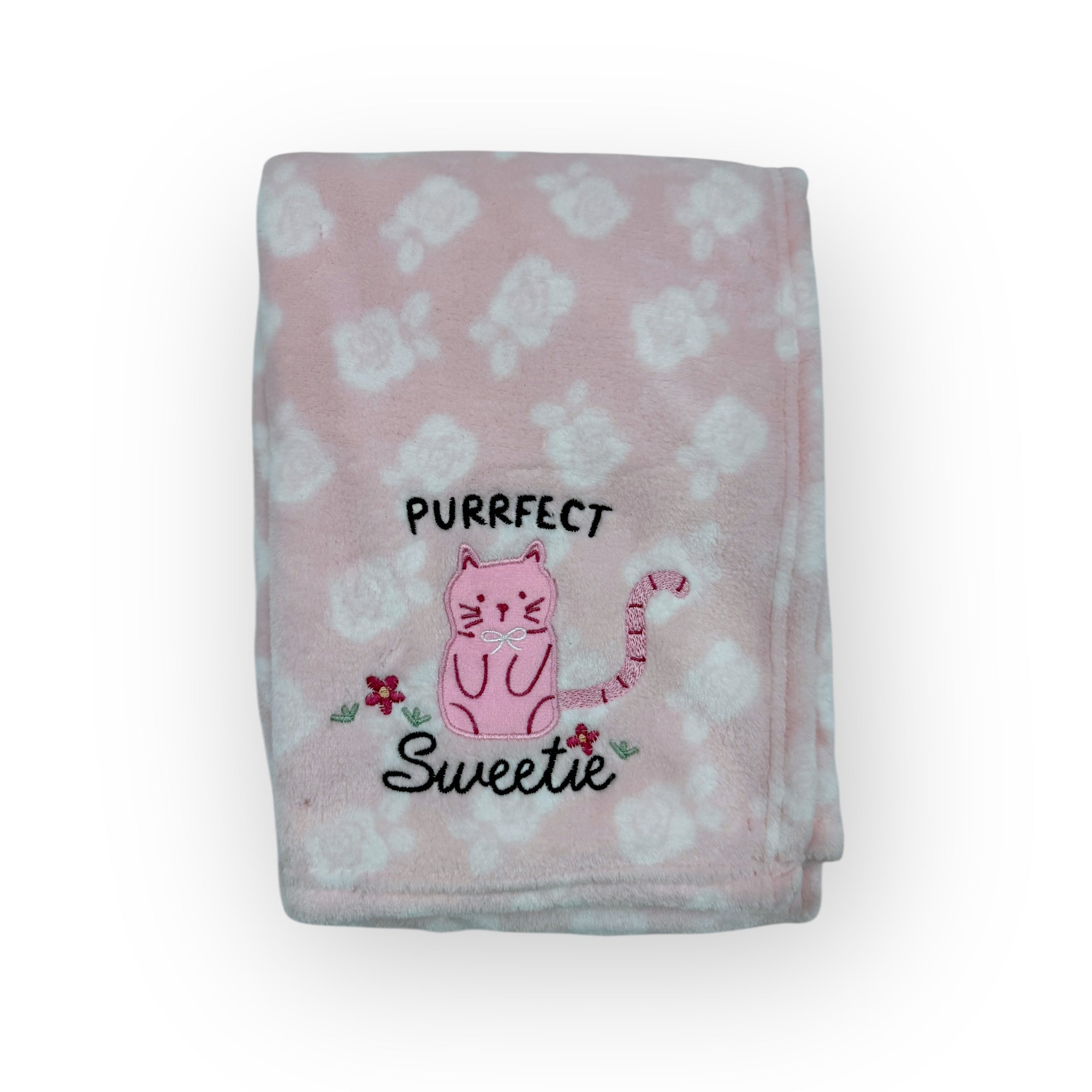 Pink blanket with cat design and text on a white background