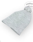 Gray knit baby hat with pom-pom on a white background, branded 'mother's choice'.