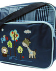 Navy blue bag with embroidered giraffe, lion, and trees design on a white background