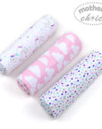 Three rolls of patterned fabric with 'mother's choice' branding on a white background