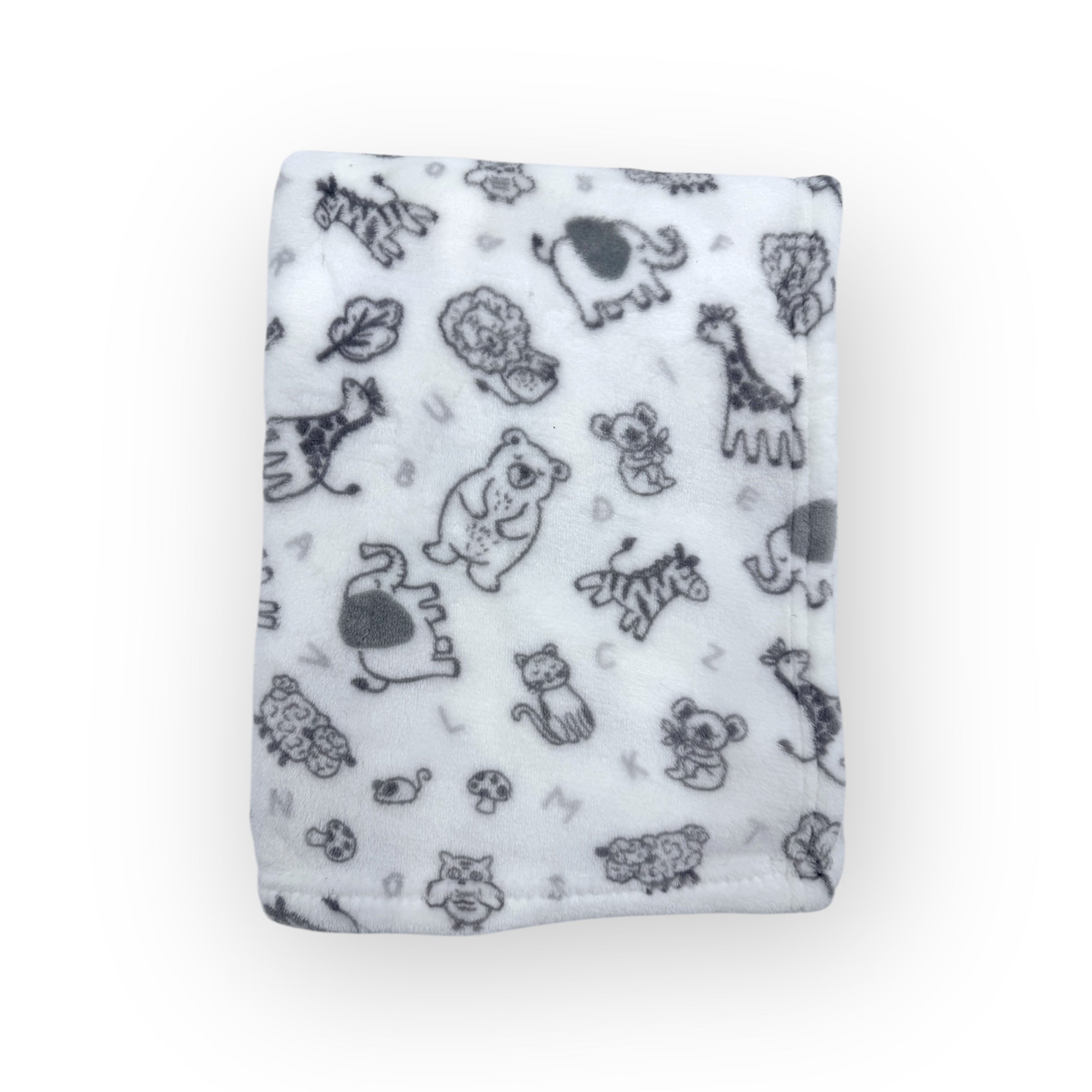 White blanket with black animal prints on a white background